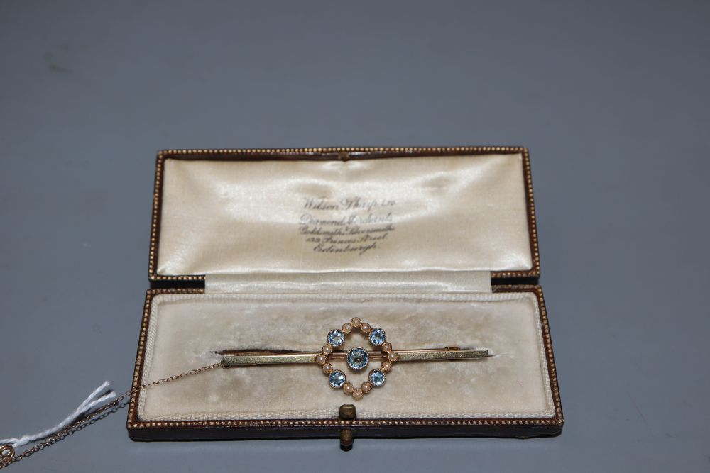 A 1920s 15ct, aquamarine and seed pearl set bar brooch, 57m, gross 4.5 grams.